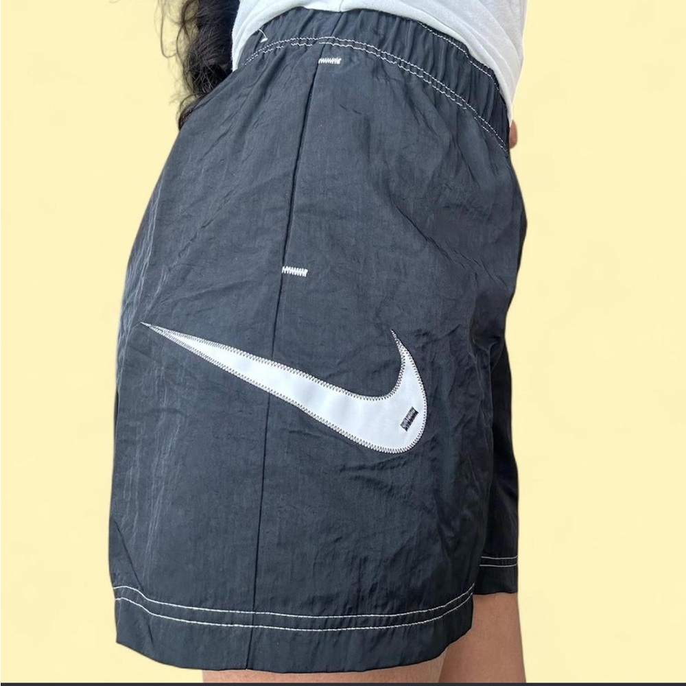 Nike women’s Black Athletic Shorts with White Swoosh Accent